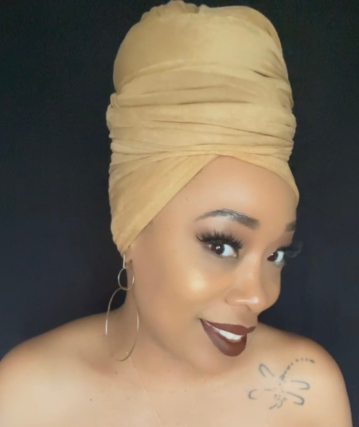 model in faux suede light brown head wrap