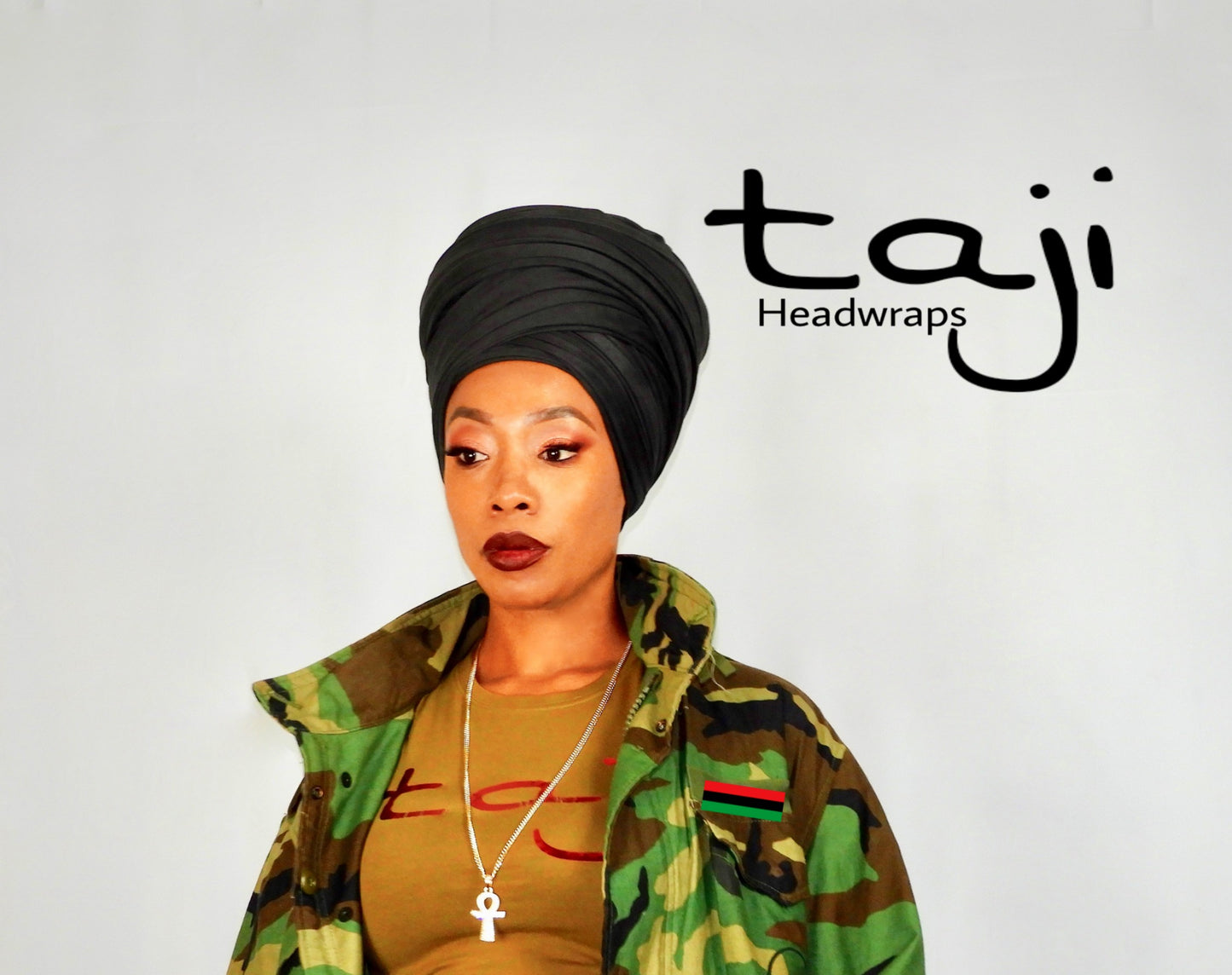 model in faux suede black head wrap