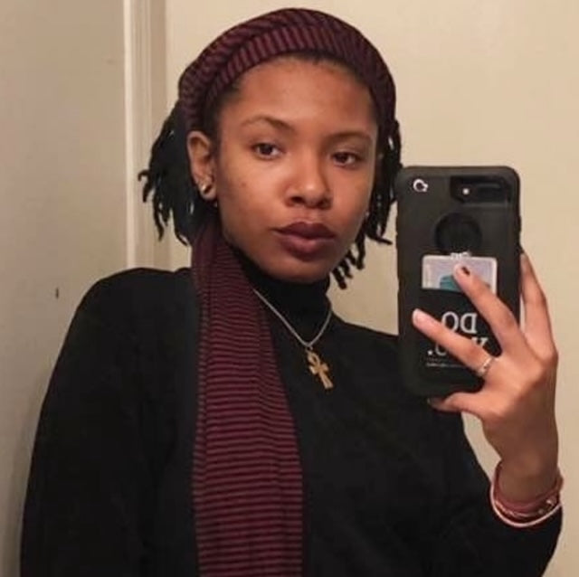 black model wearing stretch shortie maroon & black striped head wrap