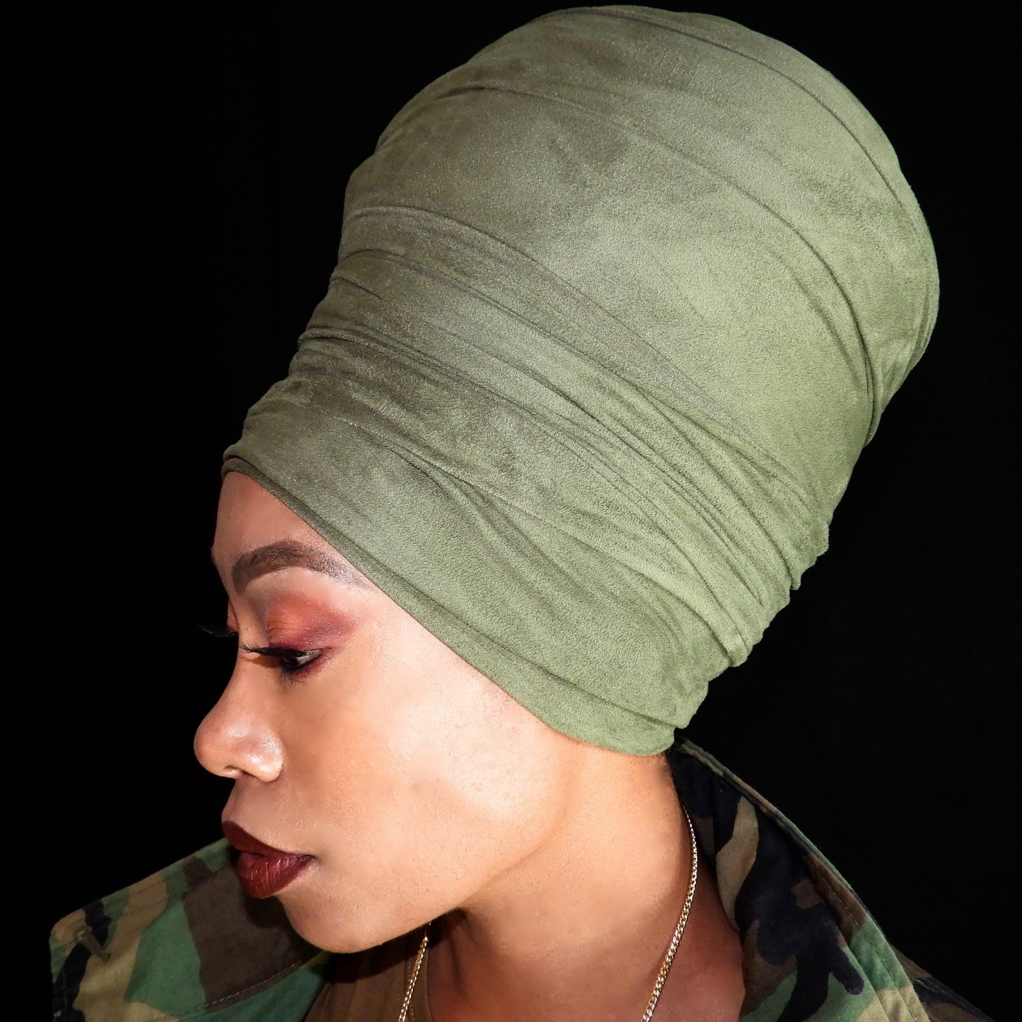 model in faux suede army green wrap