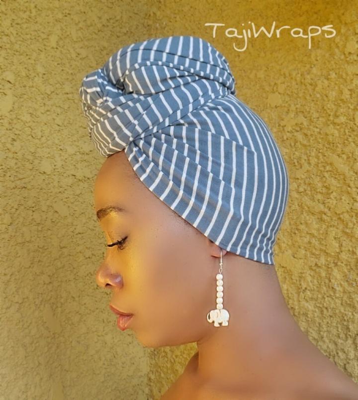 black woman wearing stretch headwrap ocean grey and white stripes