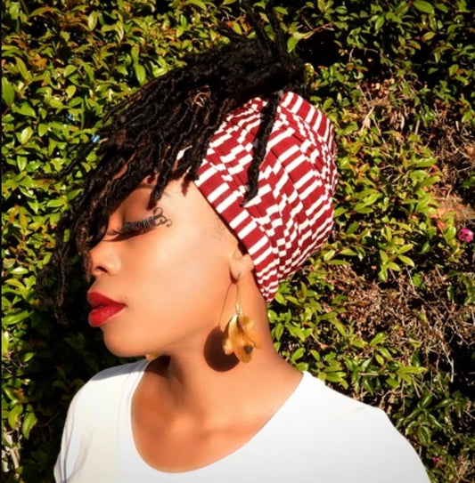 women with locs in stretch headwrap stripes maroon and white