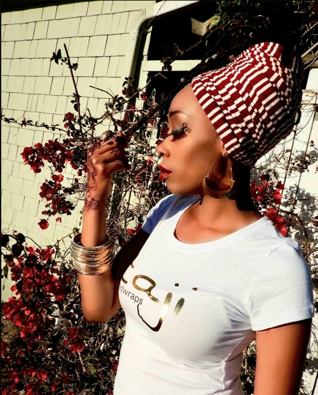 women with locs wearing stretch headwrap stripes maroon and white
